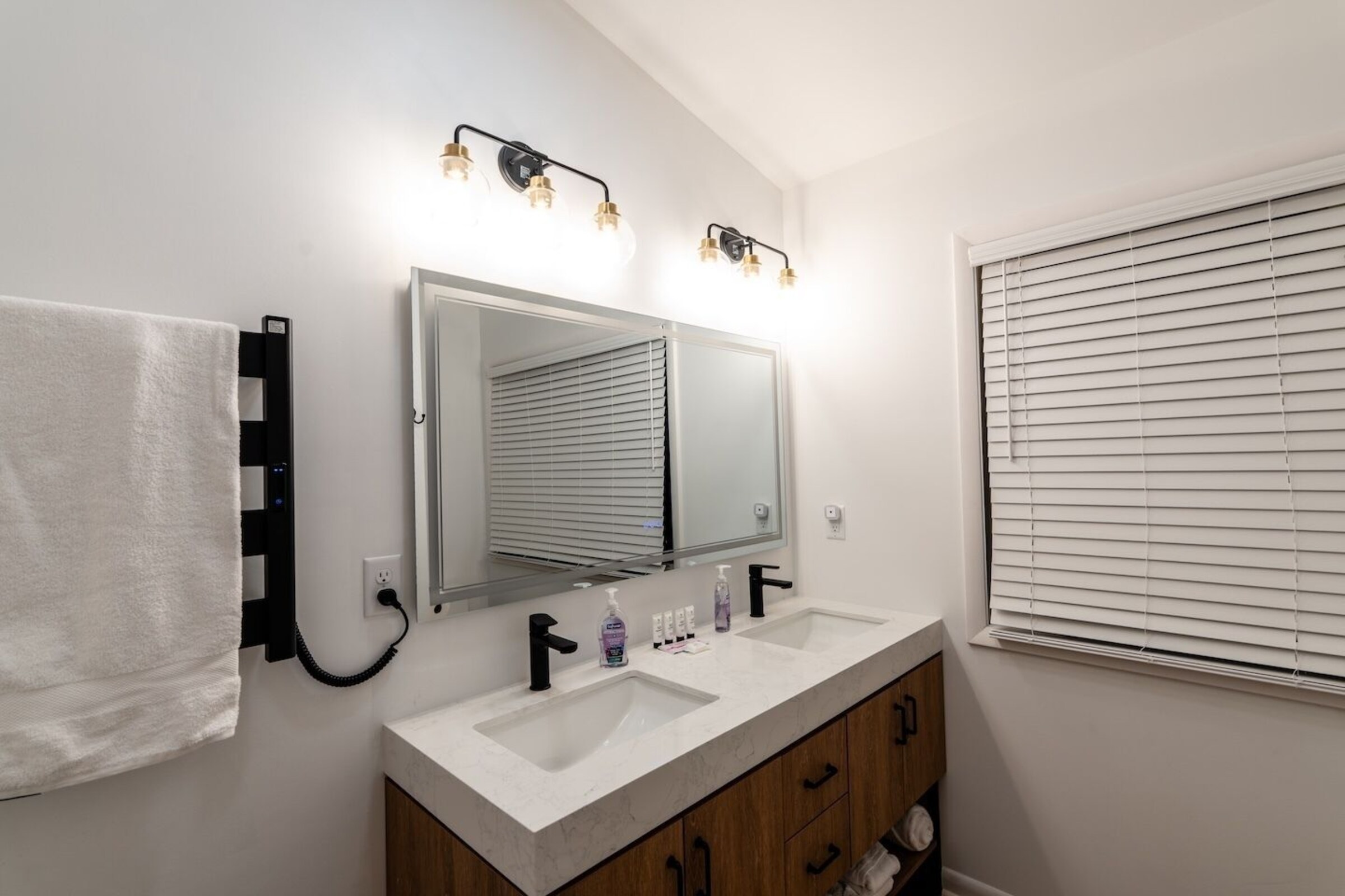 Emerald Room en-suite vanity and towel warmer